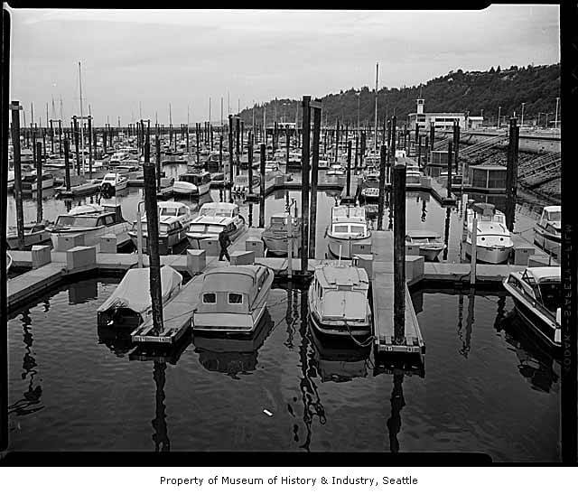 Bellingham Marine construction history - Historic Bellingham Marine construction site with cranes and workers, showcasing ear