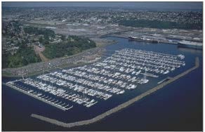 Bellingham Marine construction history - Aerial view of Elliott Bay featuring marina facilities, boats docked, and surroundin
