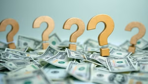 Tax Advantages of Fixed Annuities: What You Need to Know 1 money and question marks.