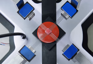 A square cardiac tissue engineering specimen being biaxially tested with BioRakes
