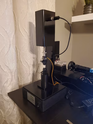 The UniVert mechanical tester with toilet paper mounted on tension grips