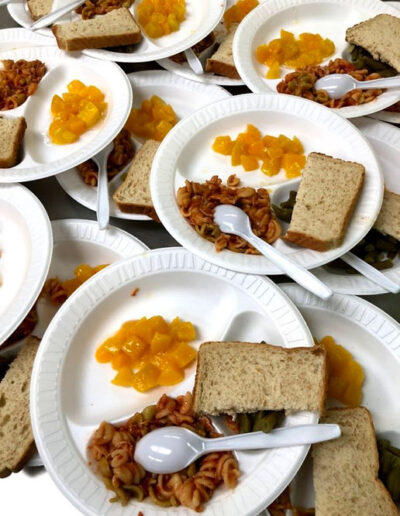 school-lunch-plates-pasta-sandwich-fruit