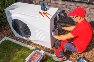 AC Repair 1 Rear view of man working on field