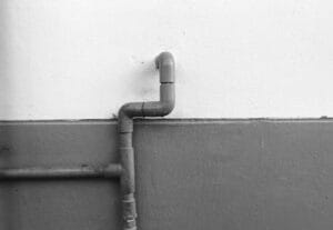 How Many Plumbing Vents Should a House Have? 3 close-up wall