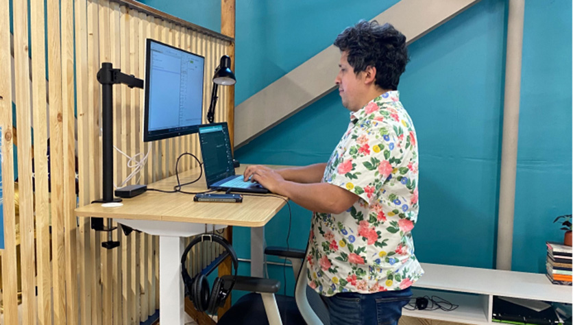 day-desk-836w-sized Person working on Stand up desk at Cowork + Connect, Hillcrest San Diego