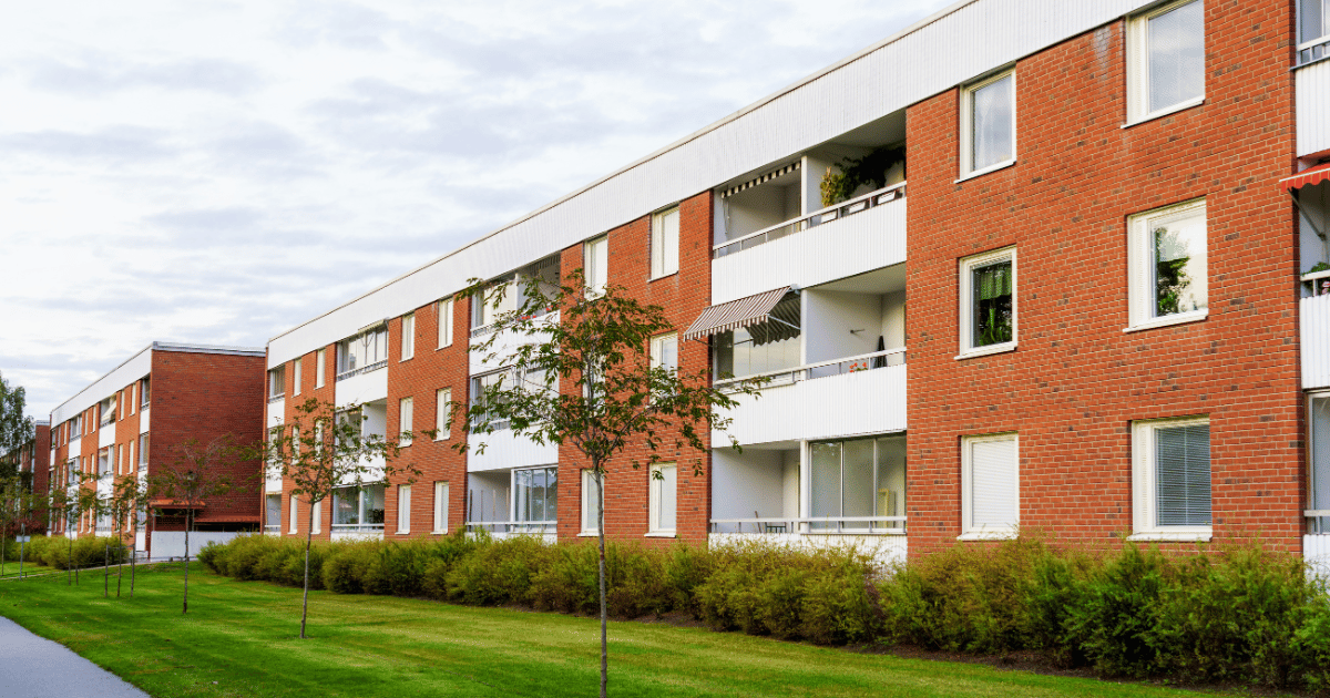 View of a brick apartment building.