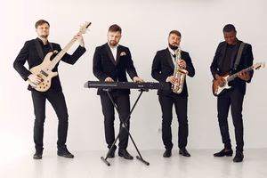 awards-img A modern jazz band with diverse musicians performing indoors with various instruments.