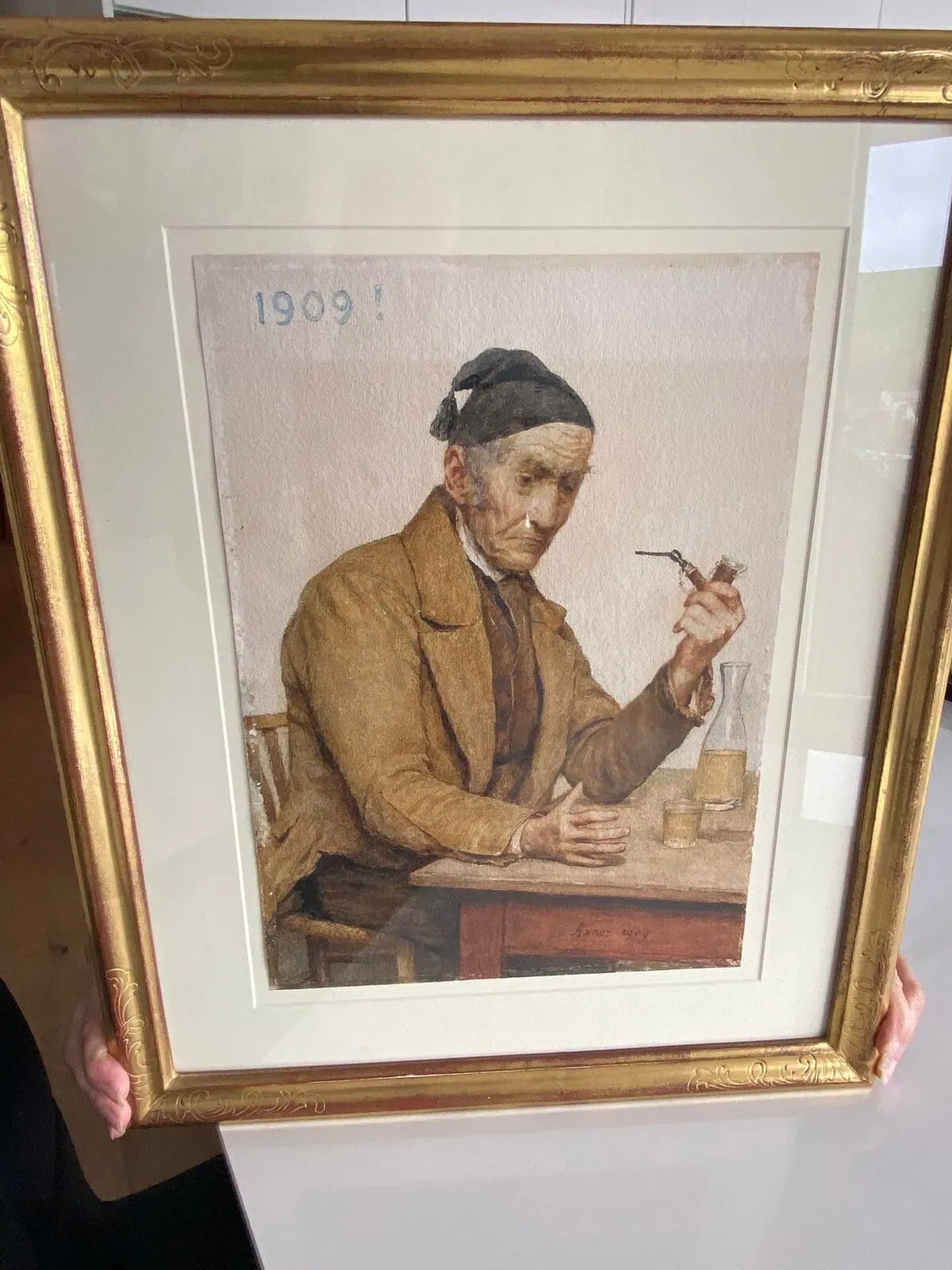 Peinture d’un vieil homme tenant une pipe, 1909.