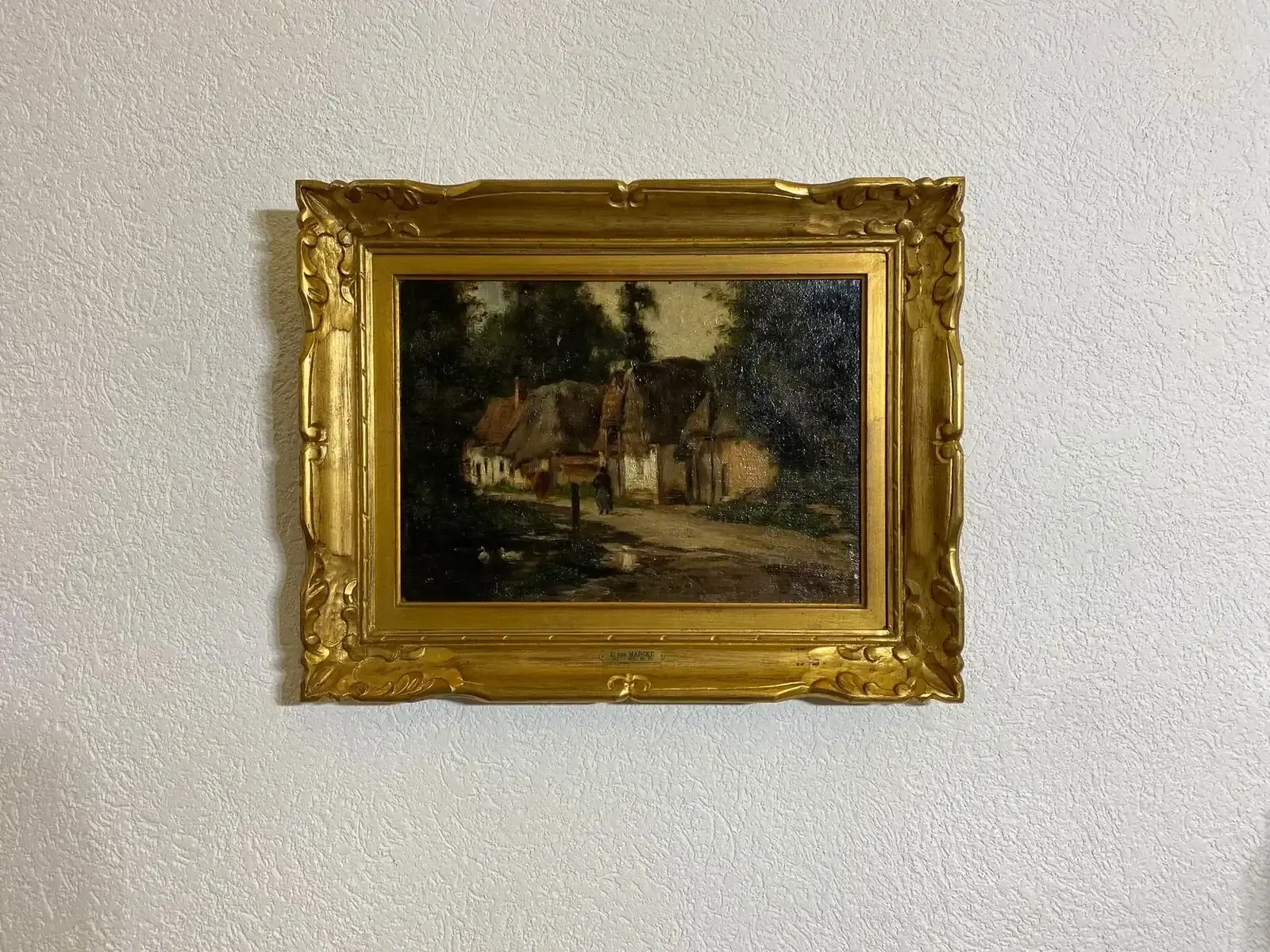 Peinture de village ancien dans cadre doré