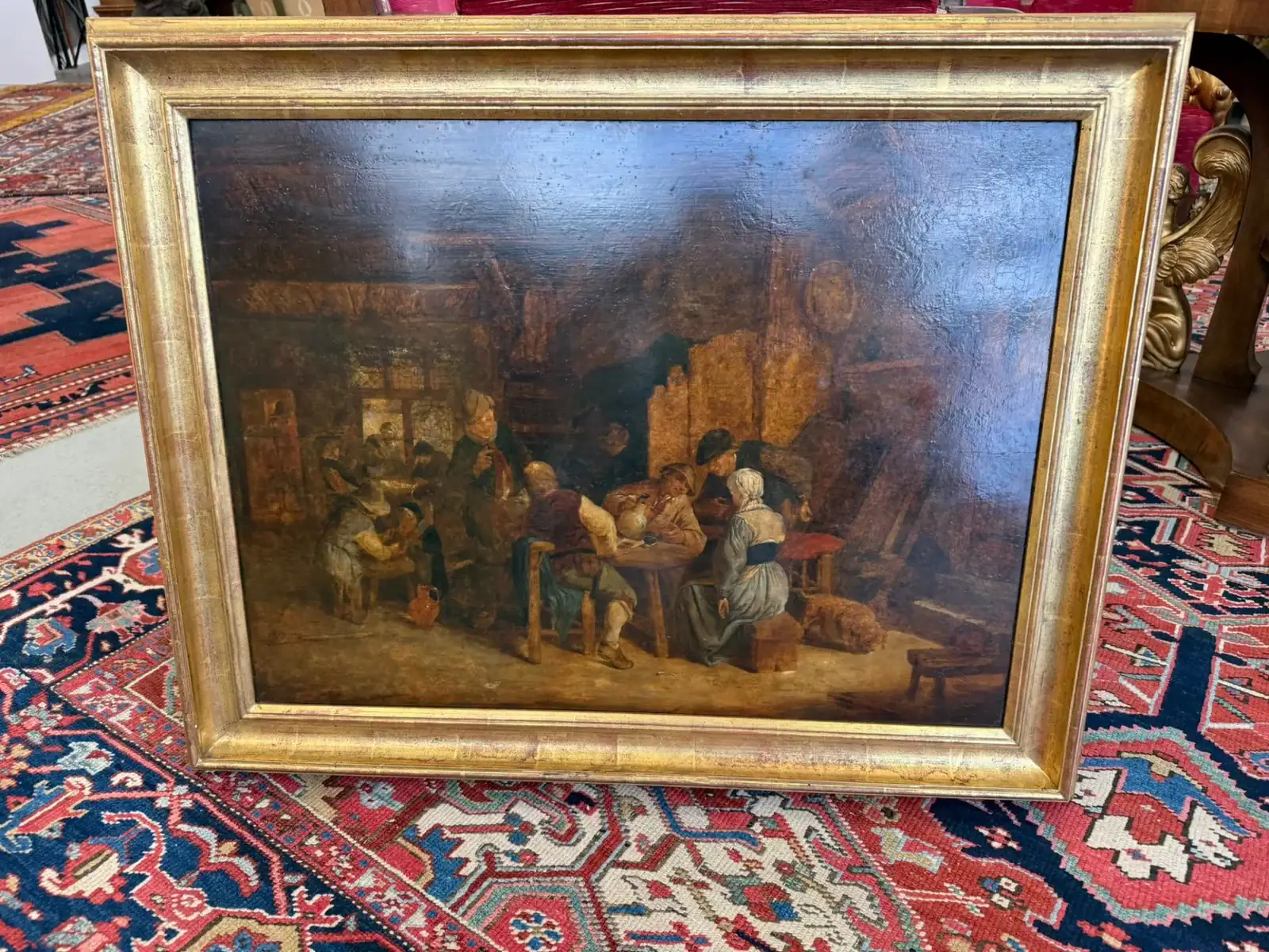 Tableau ancien représentant une scène de taverne.