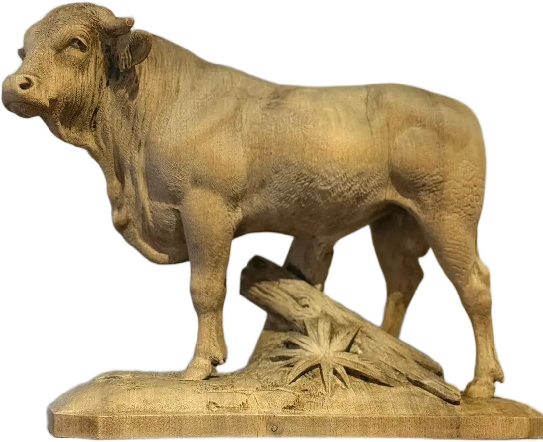 Statue de taureau en pierre sur socle sculpté