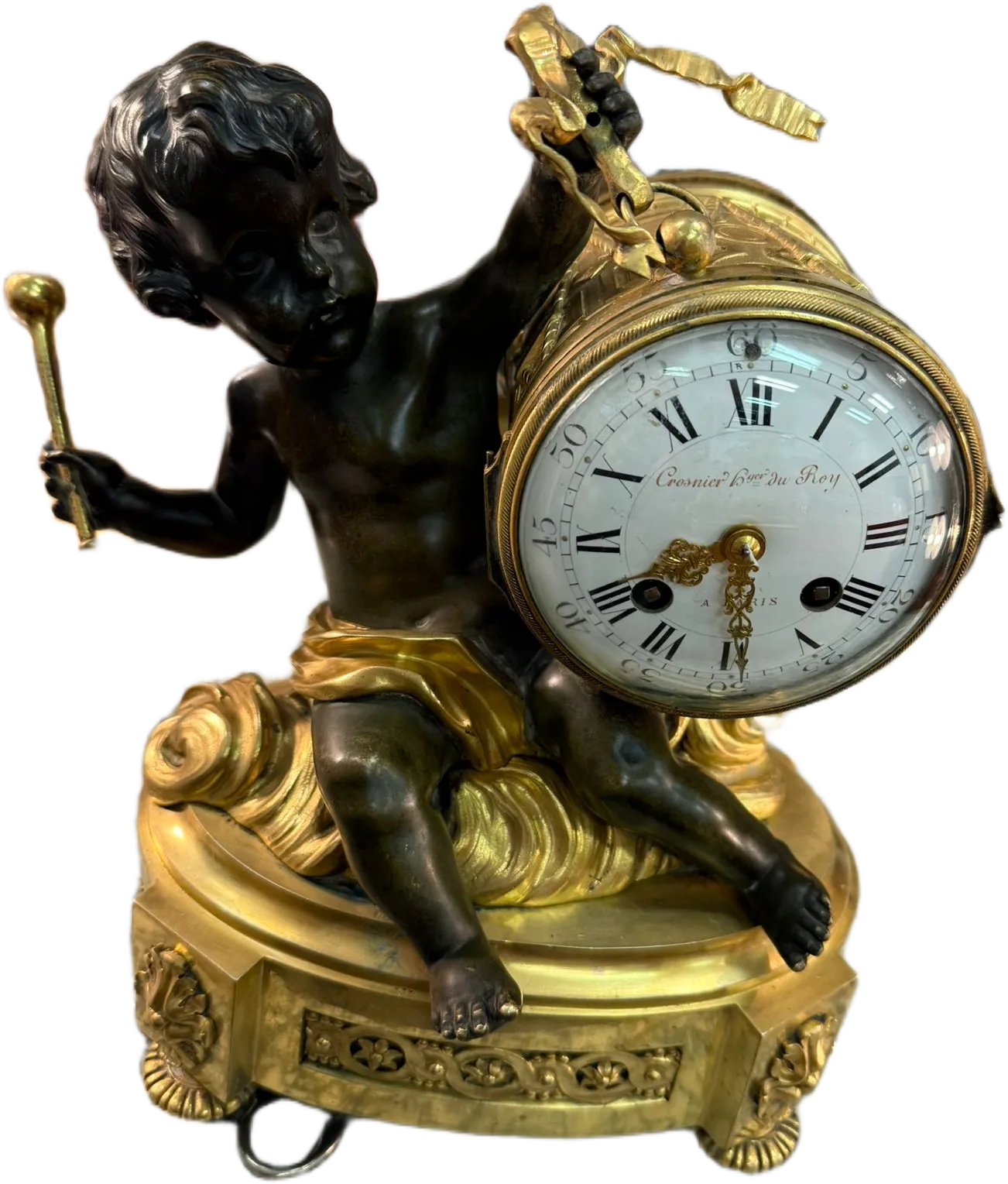 Pendule ancienne avec chérubin en bronze doré
