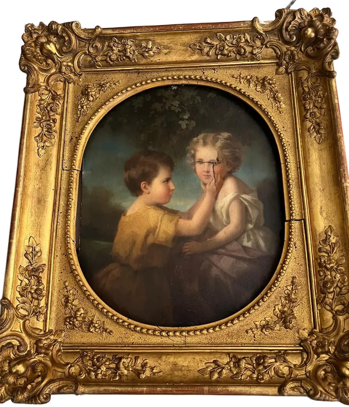 Tableau ancien d’enfants dans cadre doré orné