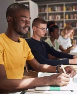 Teens Studying in Row Teens Studying in Row