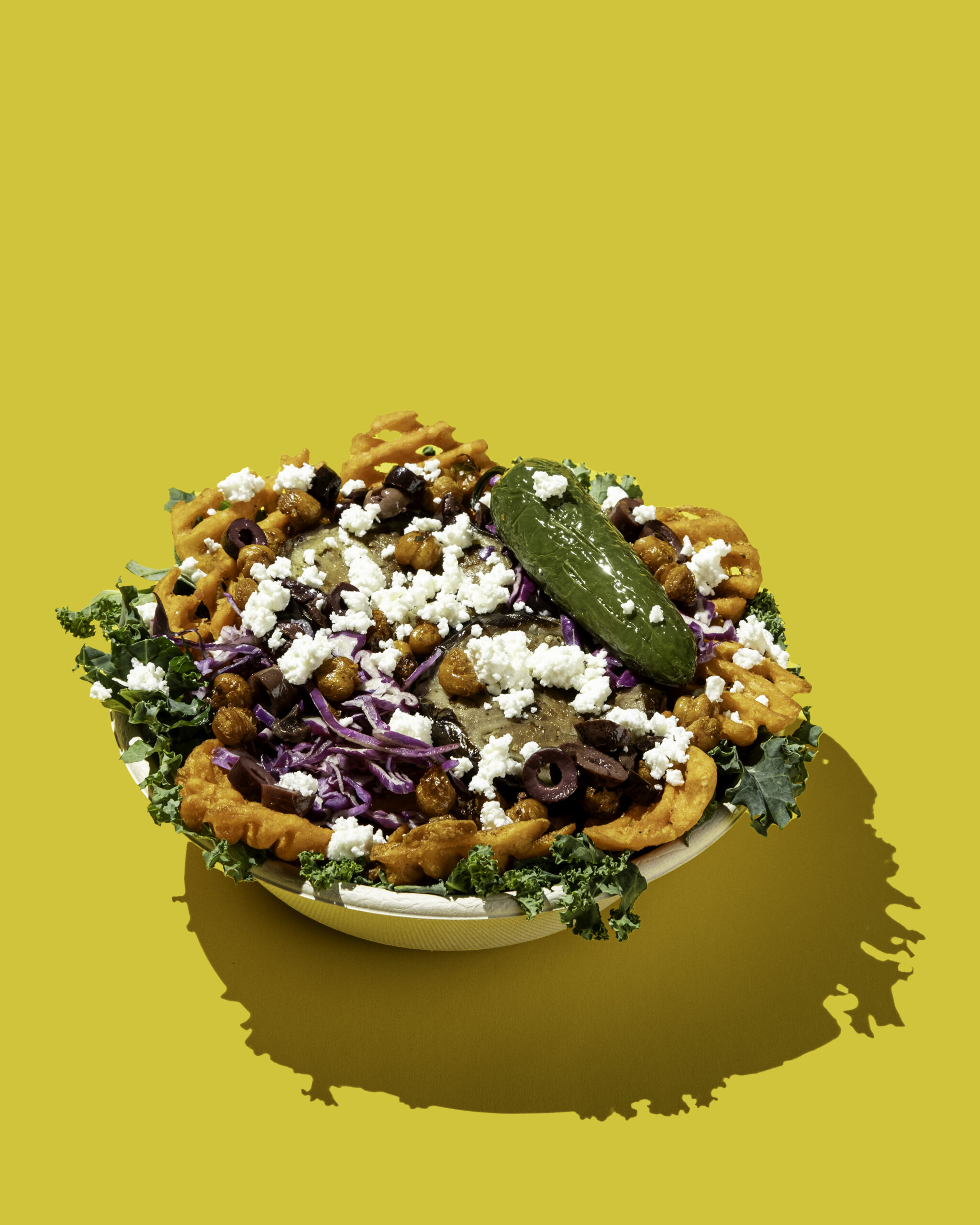 Why Owning a Neighborhood Food Business Is One of the Most Reliable Paths to Generational Wealth Fresh Mediterranean bowls at a fast-casual franchise counter illustrating what owners researching do you need a food handler license to own a franchise need to understand about food safety requirements