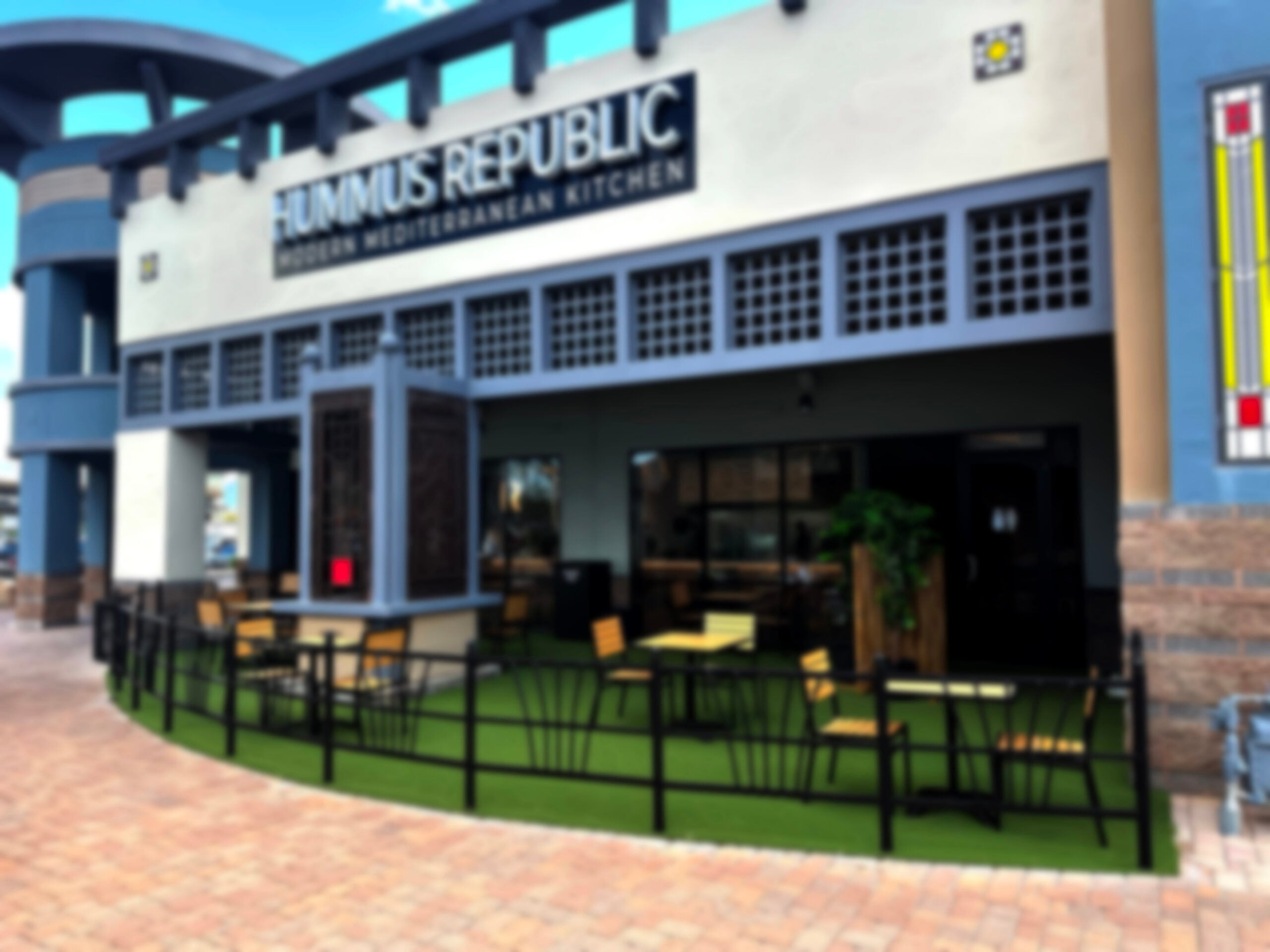 What Does It Really Cost to Open a Fast Casual Restaurant? An Honest Breakdown Hummus Republic fast casual counter displaying colorful Mediterranean dishes as part of an alternative funding for franchise purchase journey