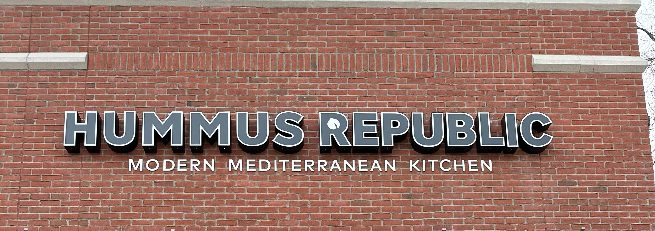 What It Means That the Food You Are Selling Is Food You Actually Grew Up Eating Fresh Mediterranean bowls at a Hummus Republic fast-casual counter — the kind of setting where knowing when to hire a general manager for your restaurant keeps service running smoothly every day