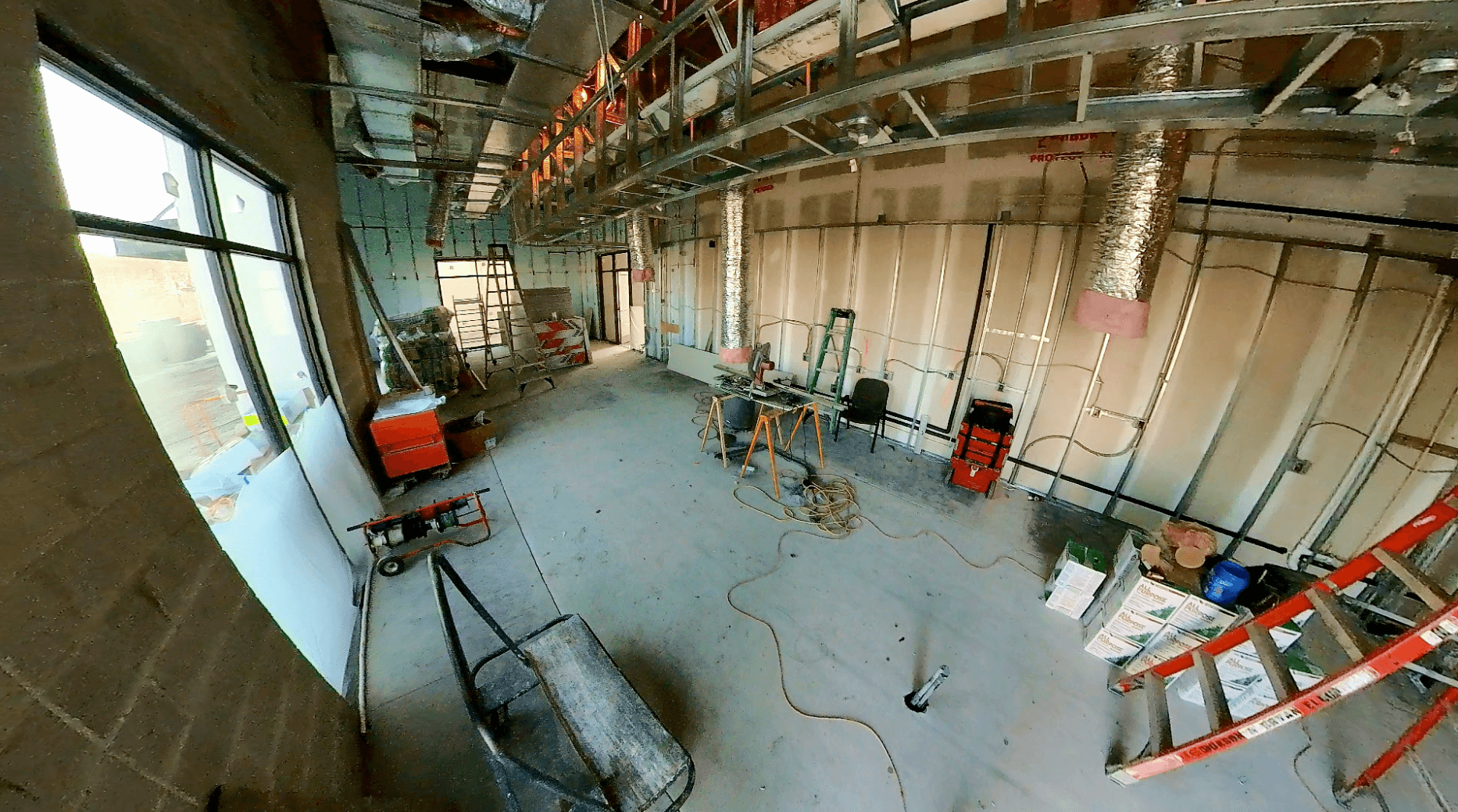restaurant buildout St. Johns FL - Interior view of a restaurant buildout in St. Johns FL, showing an unfinished space with e