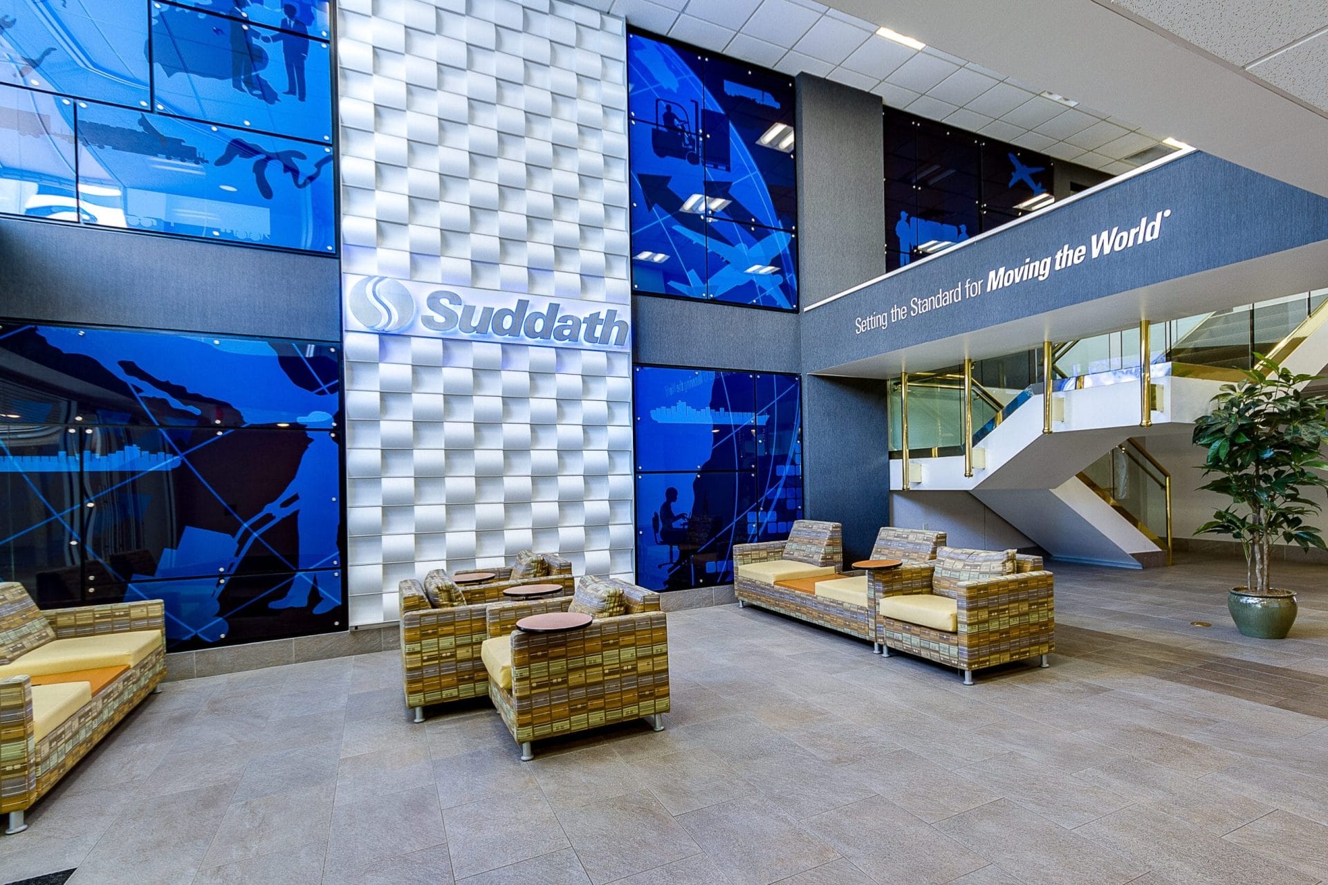 Modern corporate office construction Jacksonville with glass facade and landscaped surroundings, showcasing urban architectur