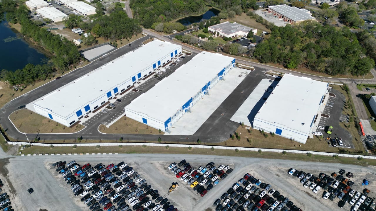 warehouse construction Jacksonville FL - A large warehouse under construction in Jacksonville, FL, showcasing steel beams and