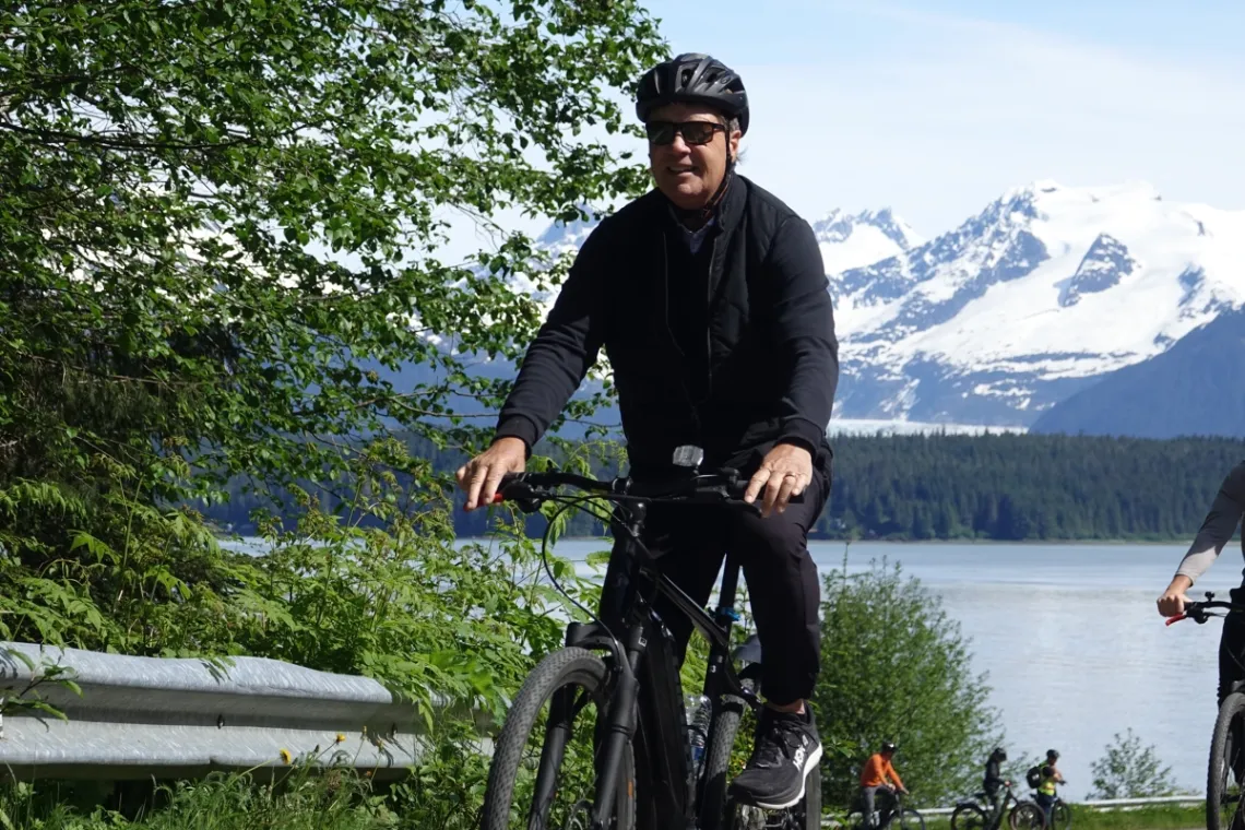 Your Ultimate Travel Guide to the Best Places to Visit in Alaska 5 Juneau rainforest ebike man bike glacier forest ocean 1200x800 1