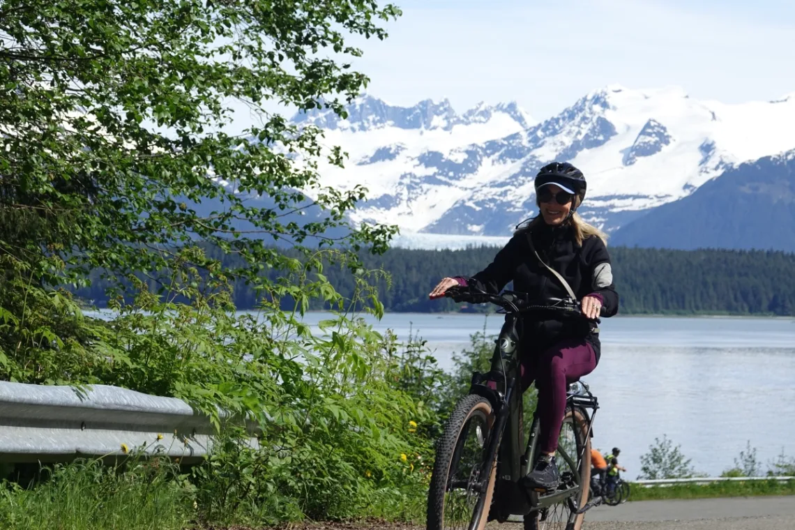 Juneau-rainforest-ebike-woman-smile-glacier-ocean-forest-view-1200x800 Juneau rainforest ebike woman smile glacier ocean forest view 1200x800 1