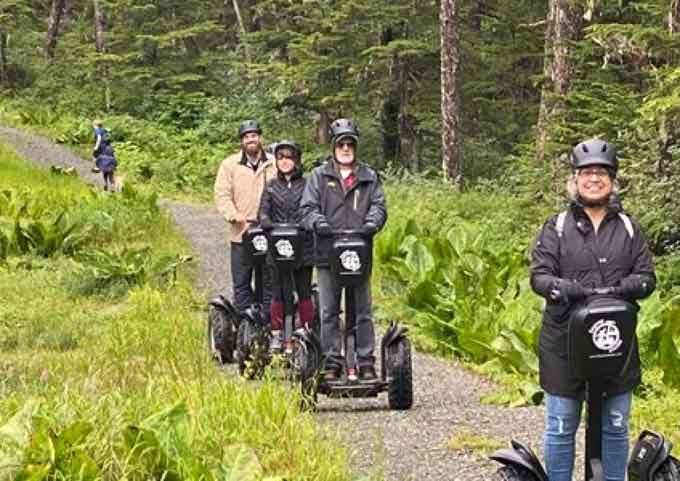 segway_excursion_section2 Group riding Segways on a lush forest trail during an iRide Alaska tour.