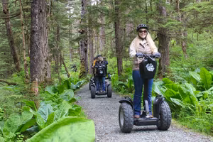 Alaska-Alpine-Segway-Forest-Smiling-Woman Alaska Alpine Segway Forest Smiling Woman