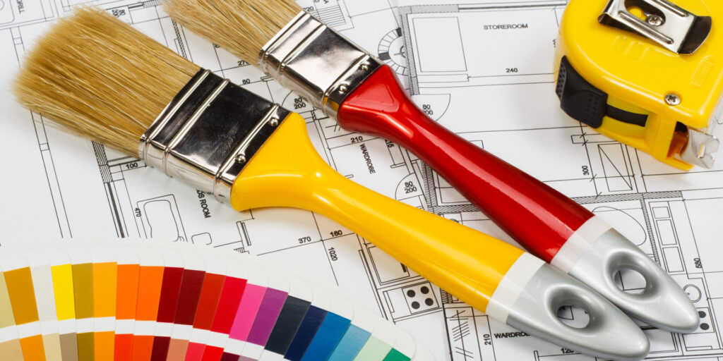 House blueprint with paintbrushes and samples of various paint sheens, illustrating options for a home painting project.