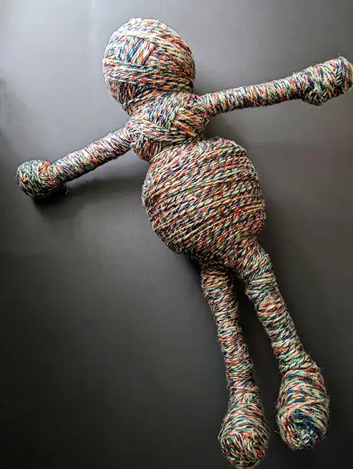Now wrapped in a colorful yarn "skin", "Leela", the You-Do-You Voodooโข art doll for health and wellness, is ready for hair and clothing.