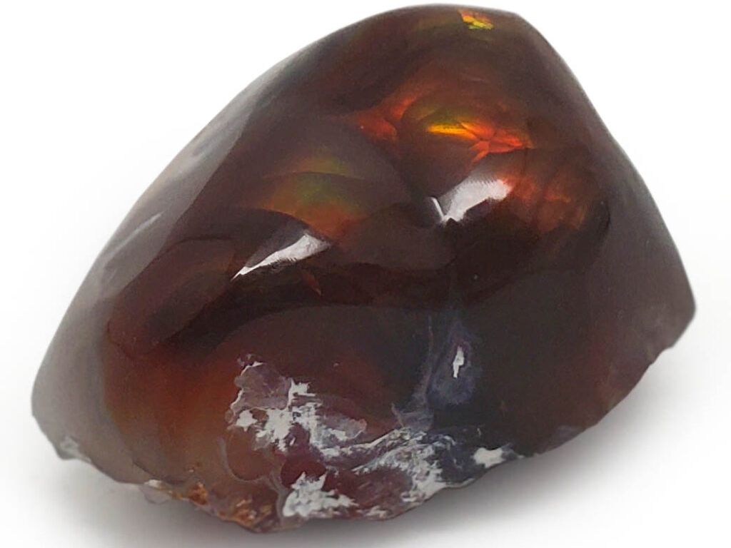 a piece of fire agate on a white background