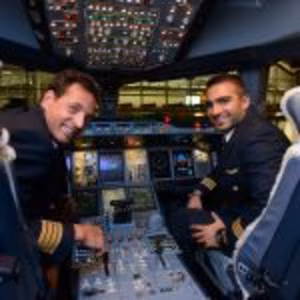 Image of commercial airline pilots in the cockpit