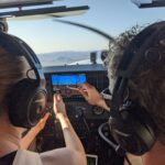 Image of a certified flight instructor giving training in flight.
