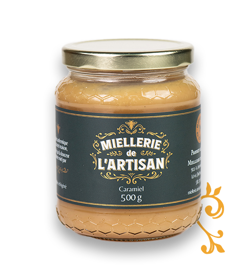 Pot de miel caramel de l'Artisan, 500g. Étiquette noire et dorée. Miel artisanal.