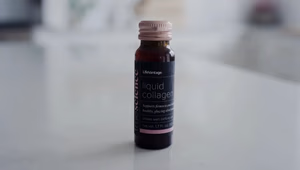 Activate Skin Collagen With Truescience Liquid Collagen 1 LifeVantage TrueScience Liquid Collagen bottle on a white countertop