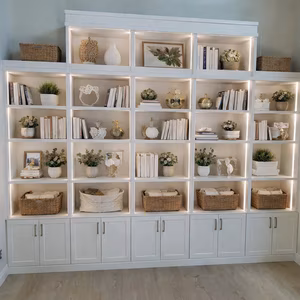 Custom designed wall cabinets Image of custom cabinetry for a livingroom.