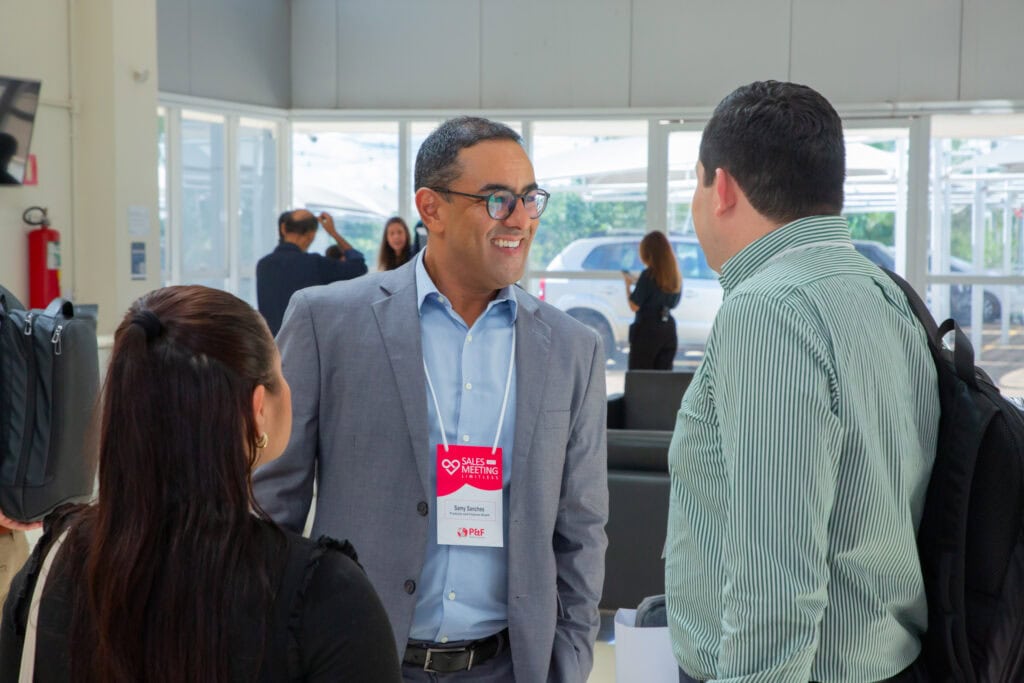 P&F Brazil team members having a conversation at the 2025 Sales Meeting