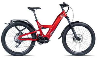 Savannah Ultra CC Red full-suspension electric bike with wide tires, fenders, and a rear rack.