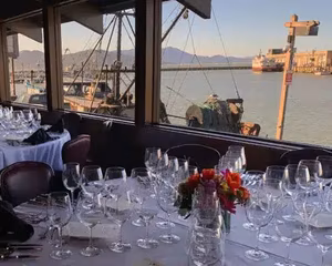 Glasses on Table with bay in the background