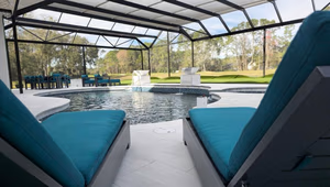 custom screen enclosures Jacksonville - Modern patio with custom screen enclosures in Jacksonville, featuring a spacious seat