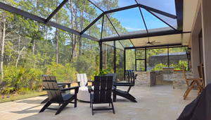 custom screen enclosures Jacksonville - A modern patio with custom screen enclosures in Jacksonville, featuring comfortable s