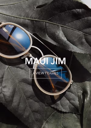 mauijim-final1_3 Round Maui Jim sunglasses with reflective blue lenses on a dark green leaf. View Frames.