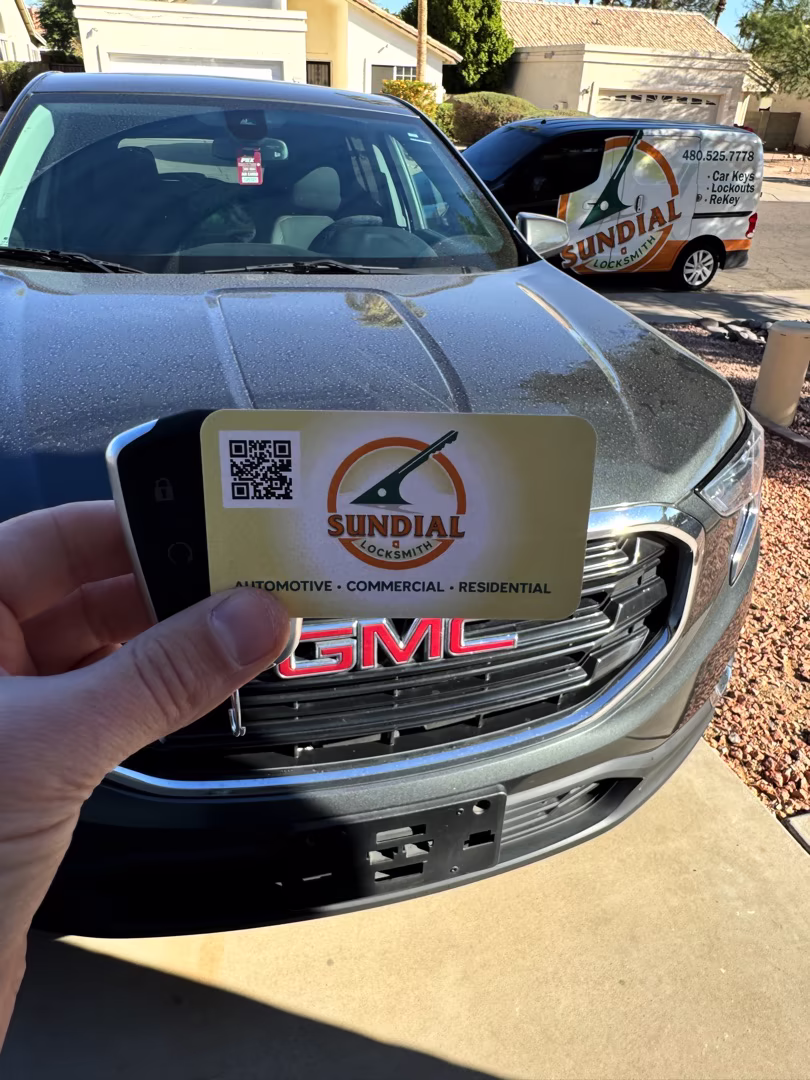 Can You Drive with a Bad Ignition Cylinder — or Is That a Bad Idea? A locksmith technician servicing a vehicle ignition cylinder in a sunny Arizona parking lot — illustrating what to do when you ask can you drive with a bad ignition cylinder
