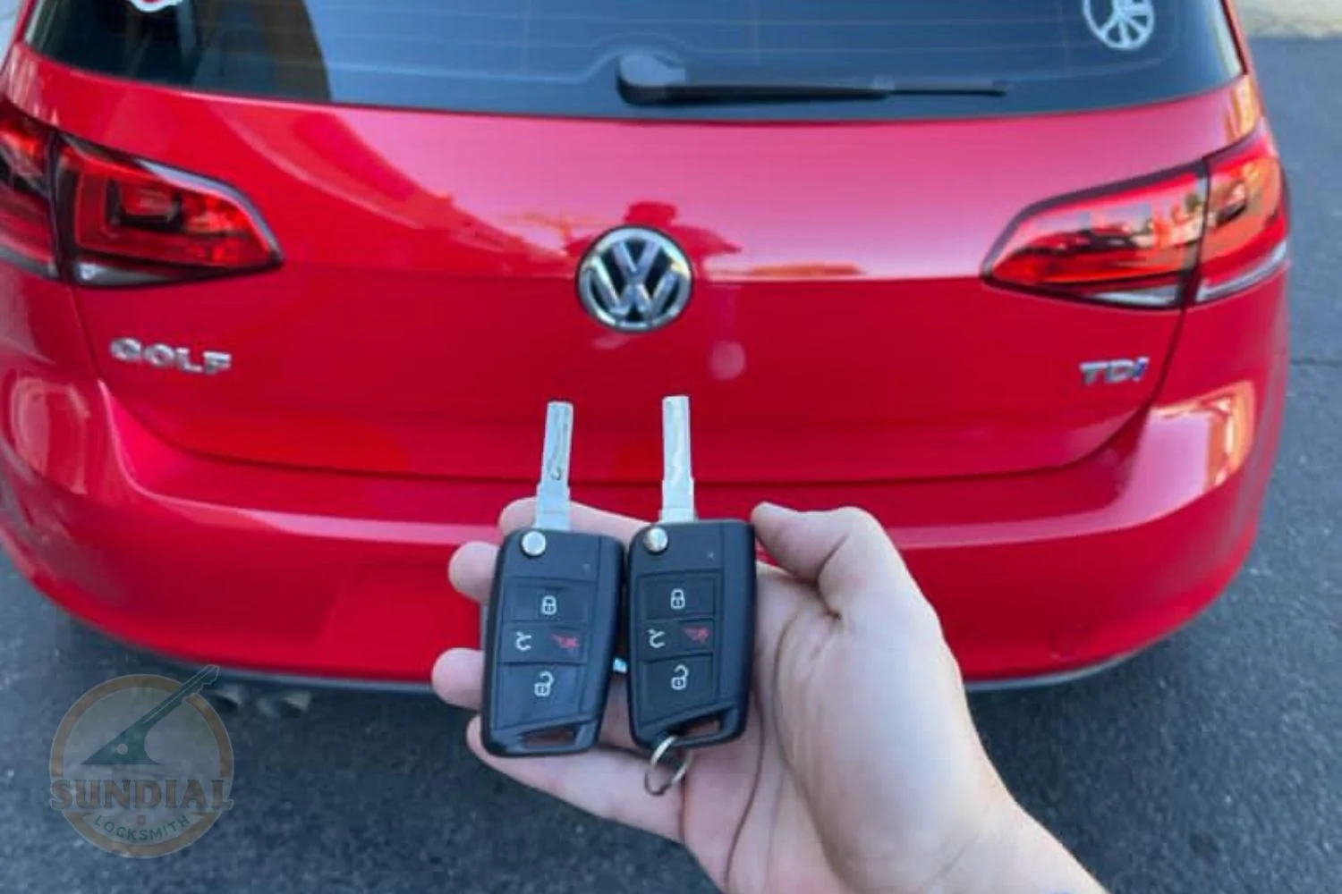 How Much Does a New Car Key Actually Cost Without a Spare? An automotive locksmith programming a new car key on-site in a sunny Arizona parking lot — the cost of new car key without spare depends on vehicle type and key technology.