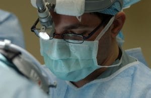 A close-up view of surgical instruments arranged neatly on a sterile tray, highlighting precision and readiness for a procedu