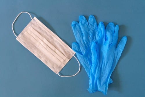 Is Pest Control Safe: Health Risks & Safety Tips 1 Medical mask and gloves