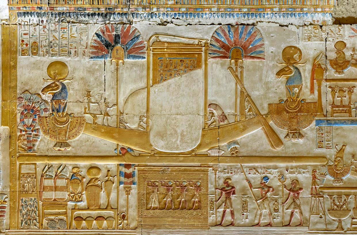 Ancient Egyptian wall painting showing a boat with people, highlighting historical travel and culture in Egypt.