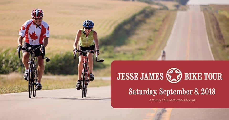 Cyclists enjoying scenic ride in open countryside for health and wellness.