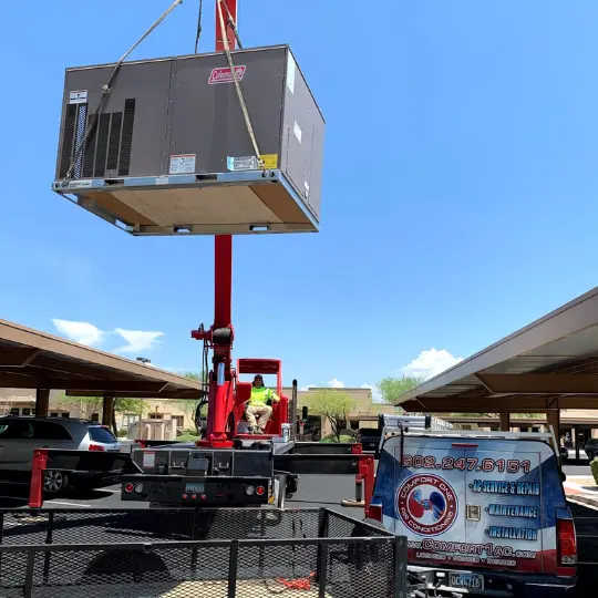 HVAC Project Portfolio 14 Coleman AC installation in Paradise Valley Village Arizona, new coleman ac unit is being installed with a crane by Comfort One Air Conditioning LLC