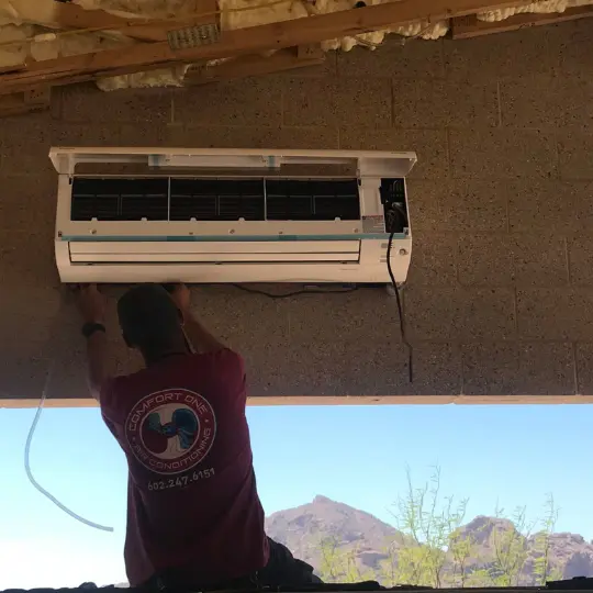 HVAC Project Portfolio 25 EPA certified technician Jon conducts a mini split ac installation in Carefree, Arizona